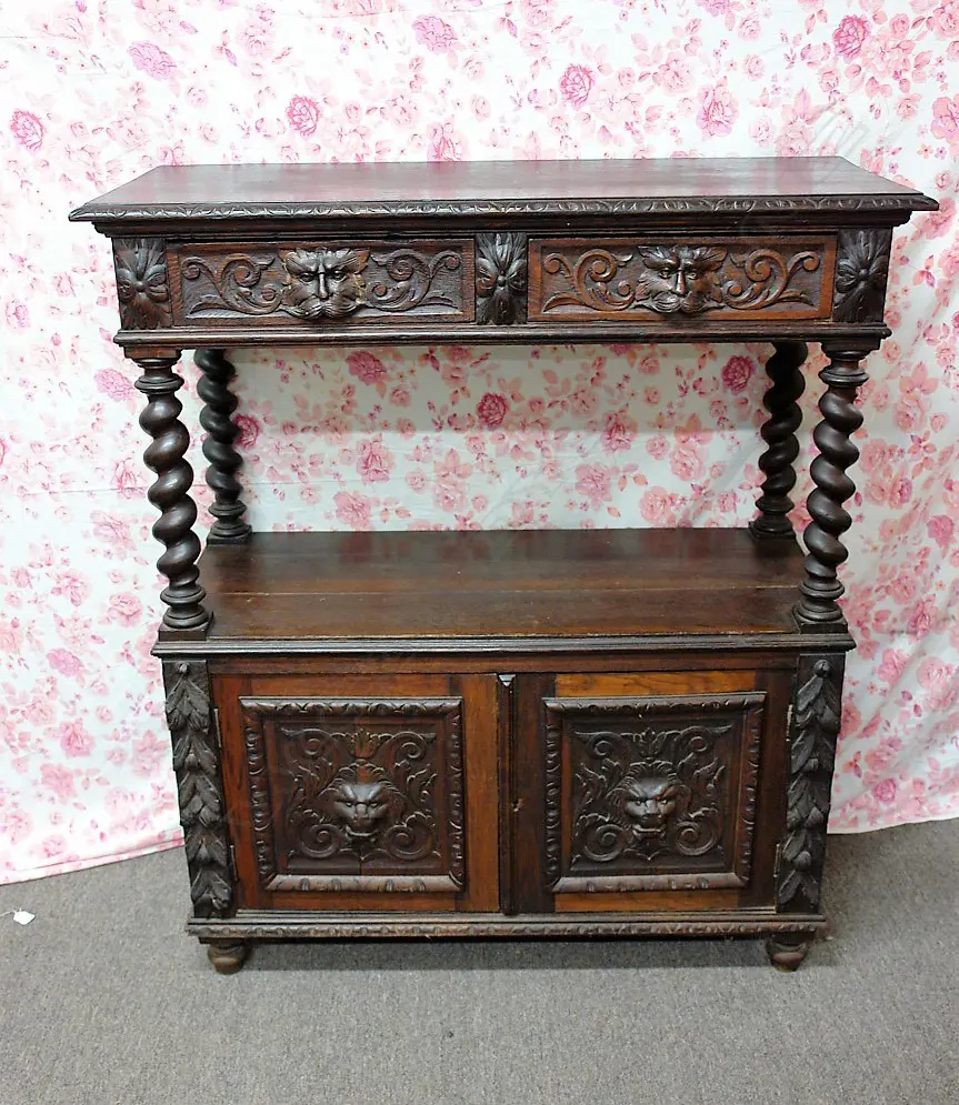 A late 19thC oak carved small court cupboard Image 1++