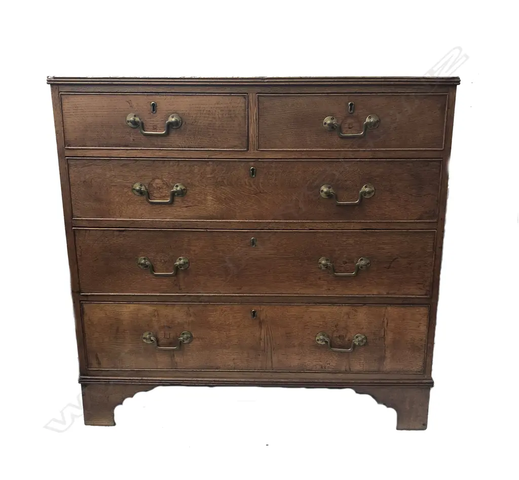 A Georgian oak flat-front chest of drawers Image 1++