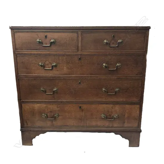 A Georgian oak flat-front chest of drawers
