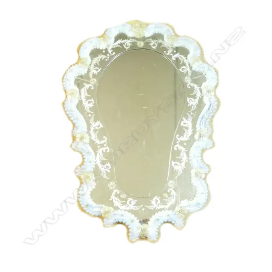 A vintage Venetian glass mirror