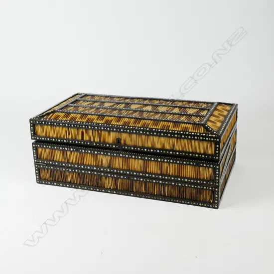 A large Ceylonese porcupine quill and ebony box