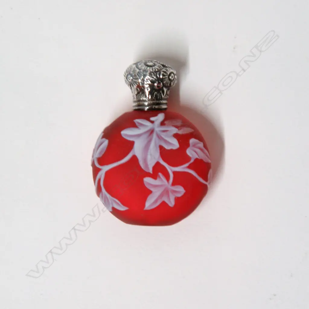 A small Victorian Thomas Webb cameo glass silver topped scent bottle Image 1++