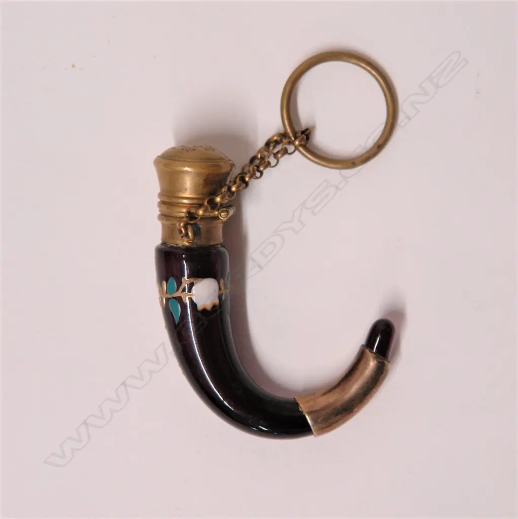A Victorian deep amethyst glass scent phial Image 1++