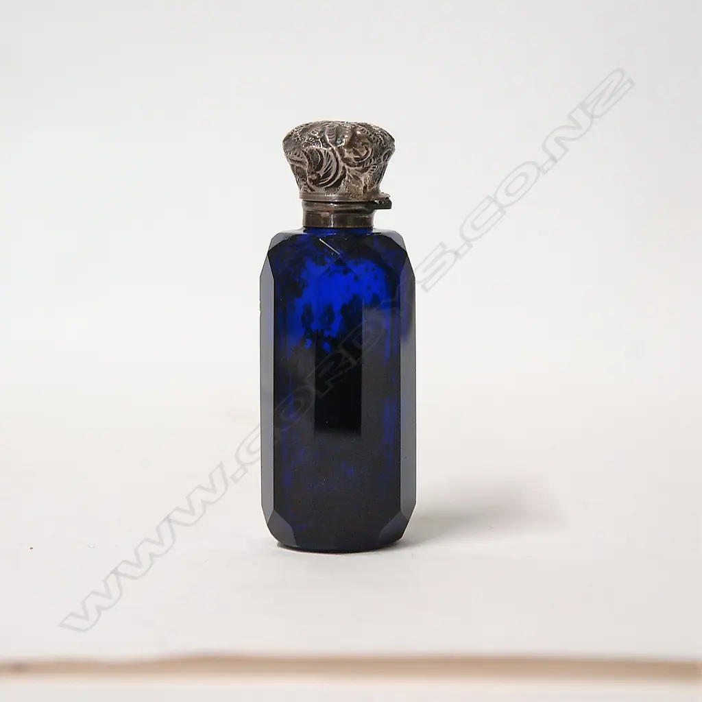 A Victorian Bristol blue glass and silver topped scent bottle Image 1++