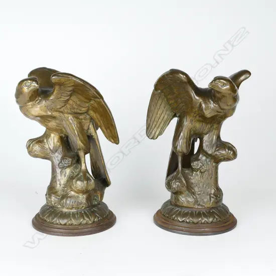 A pair of 19thC bronze eagles