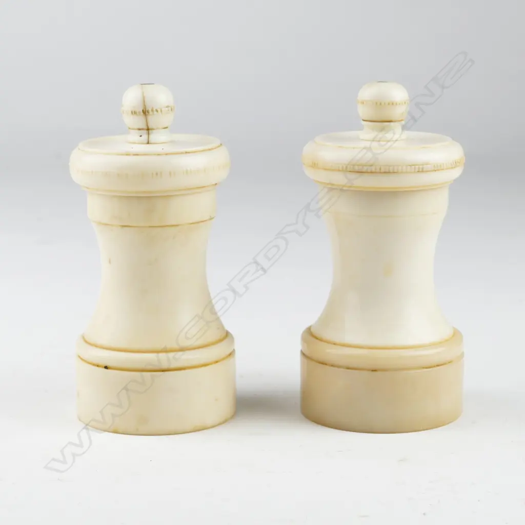 A pair of antique ivory pepper mills Image 1++