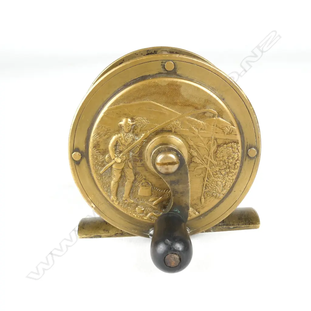 A rare and unusual English 2¼” brass reel Image 1++