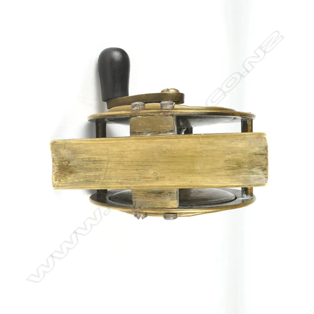 A rare and unusual English 2¼” brass reel Image 1++