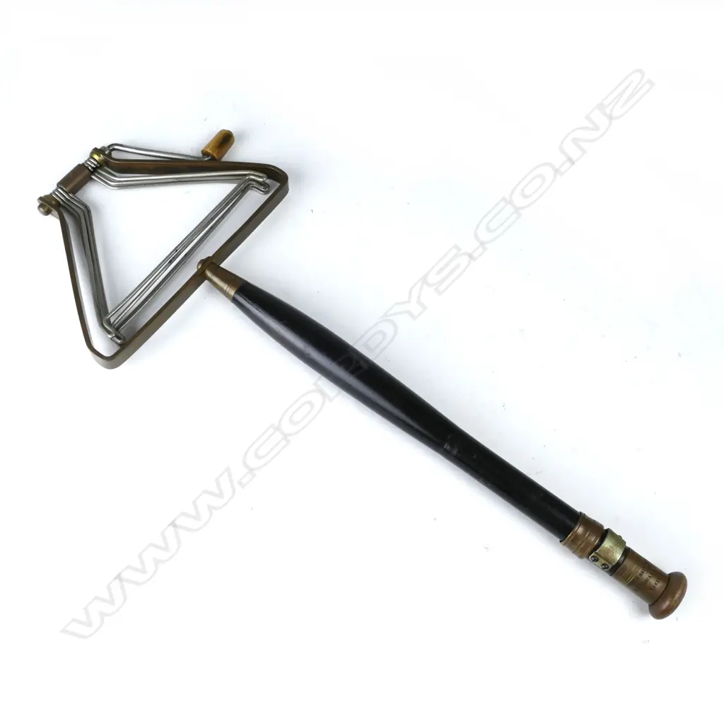 A 13” Army & Navy Soc. Ltd line winder Image 1++
