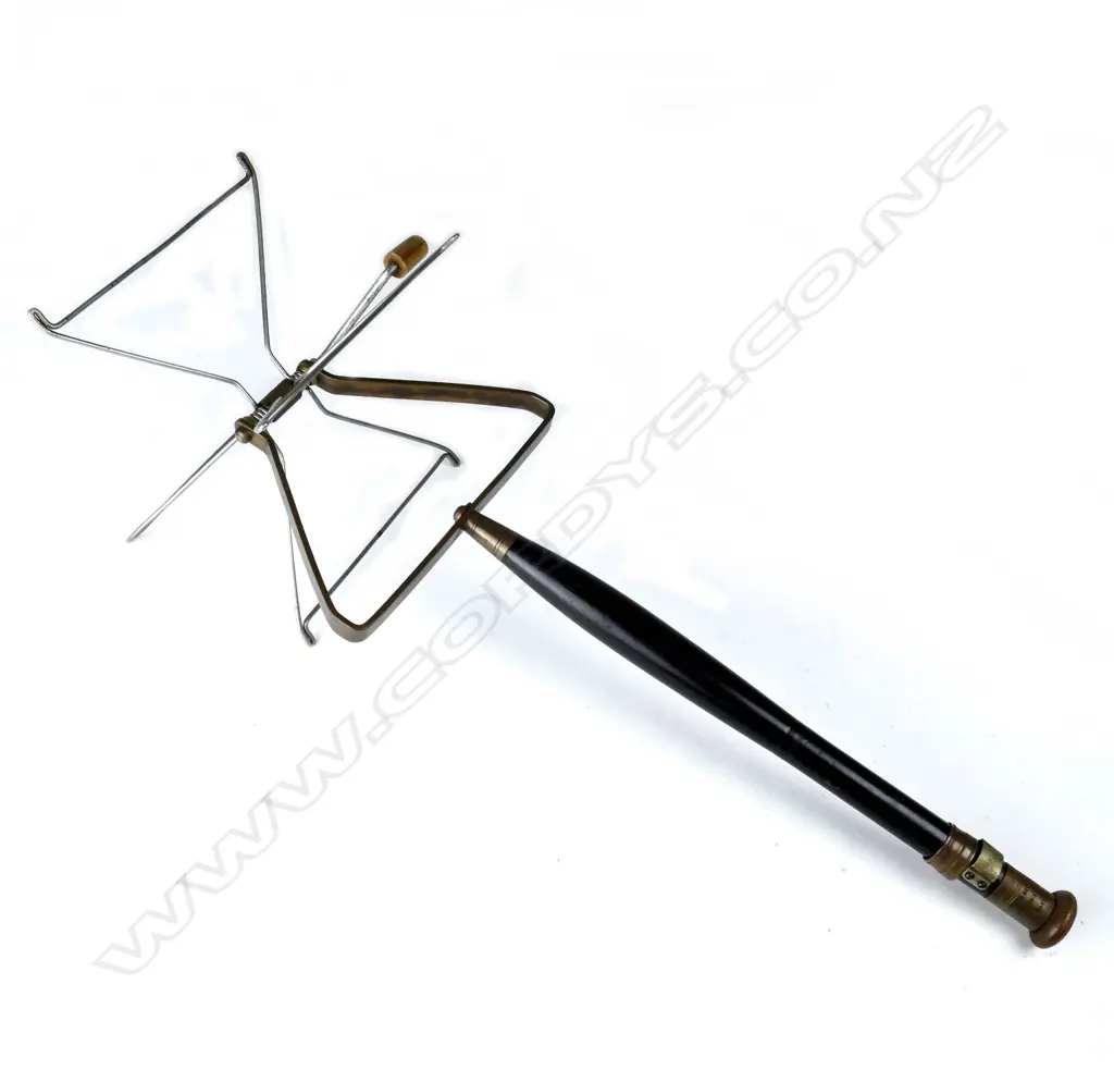 A 13” Army & Navy Soc. Ltd line winder Image 1++