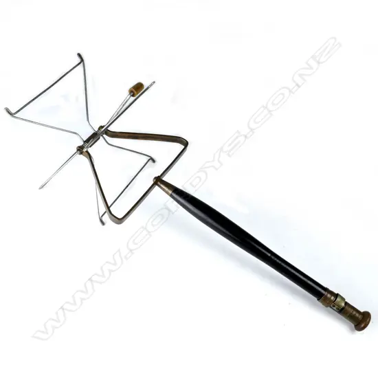 A 13” Army & Navy Soc. Ltd line winder
