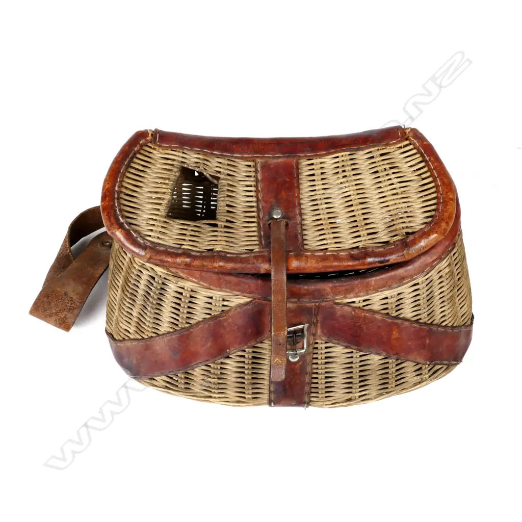 A wicker fishing creel with leather trim Image 1++