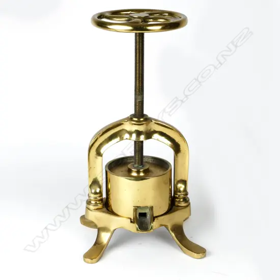 A heavy 19thC brass duck press