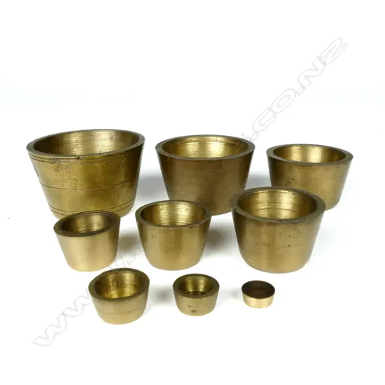 A set of brass Troy bucket weights