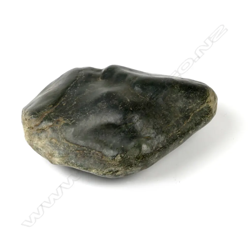 A strongly river worn pounamu boulder Image 1++