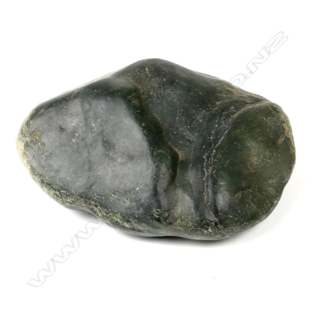 A strongly river worn pounamu boulder Image 1++