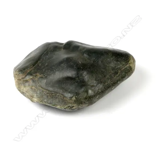 A strongly river worn pounamu boulder