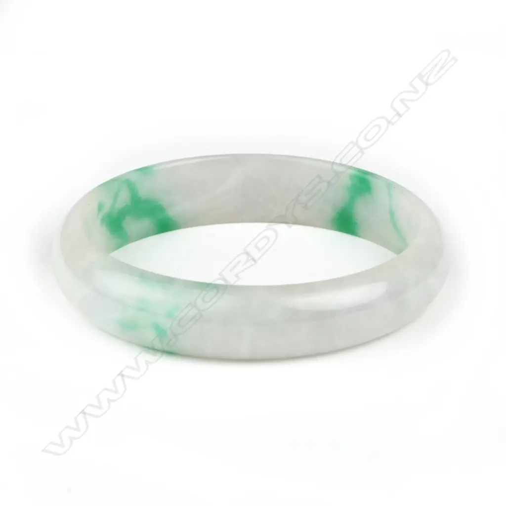 A mottled white-green Chinese jade bracelet Image 1++