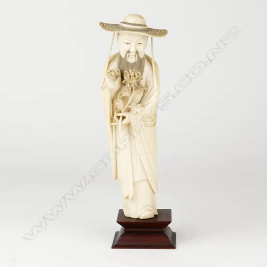 A Chinese ivory figure 'The Flower Expert'