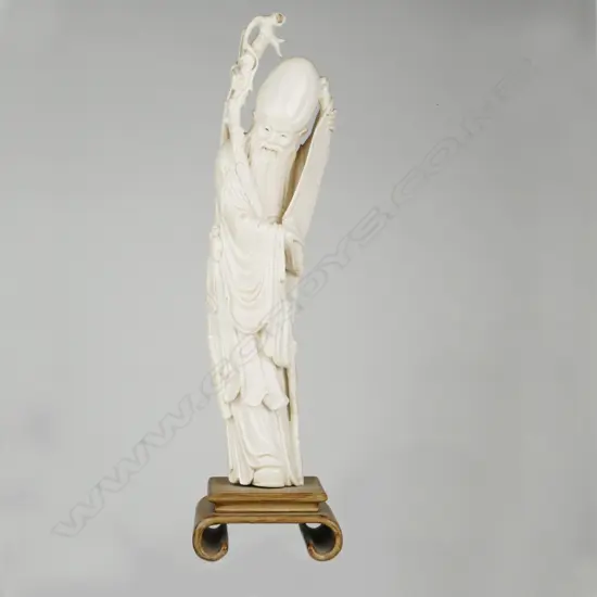 An exuberantly carved Chinese ivory figure of Shou Lao