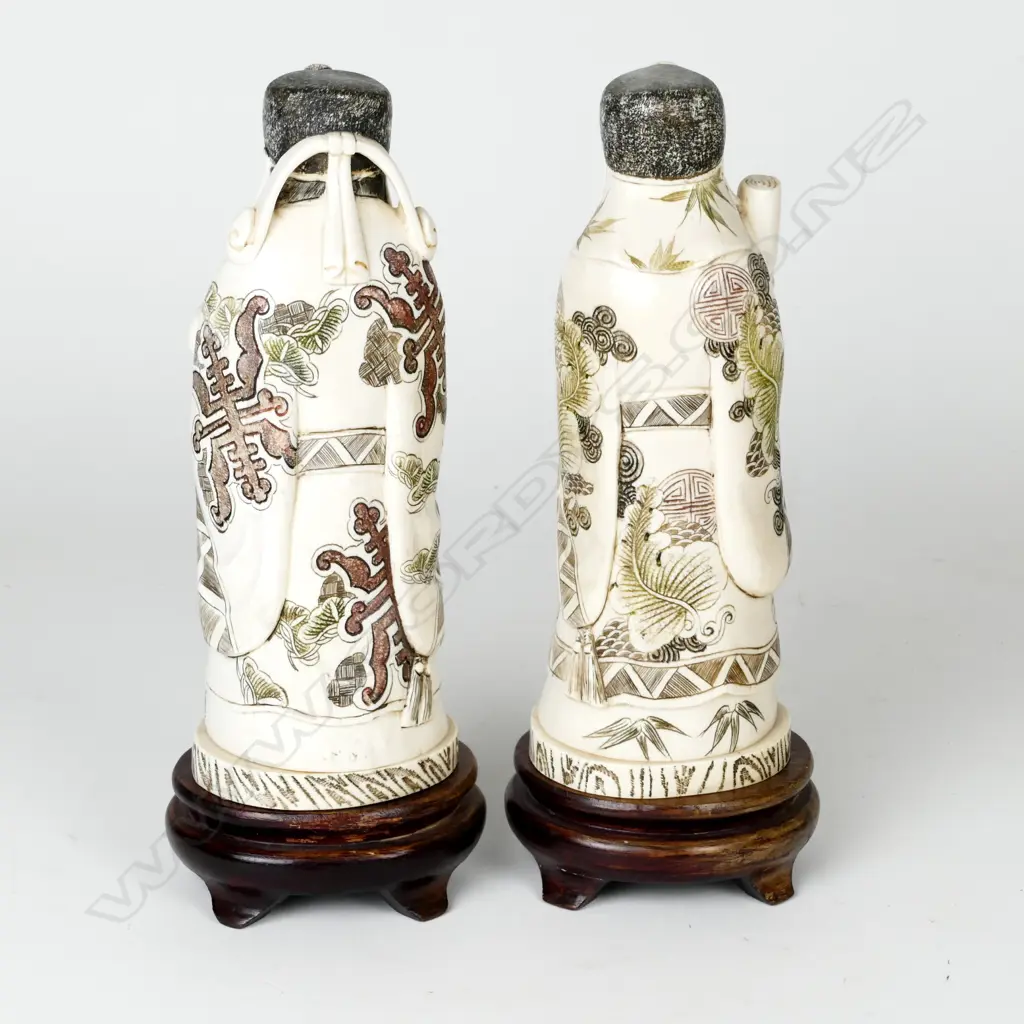 A pair of Chinese ivory figures of noblemen Image 1++