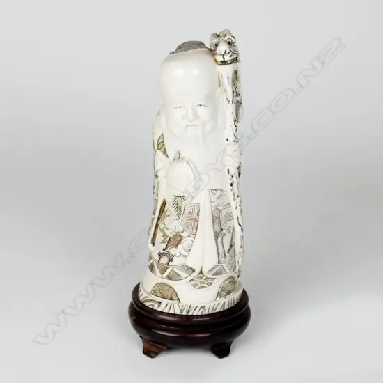 A Chinese ivory figure of Shou Lao