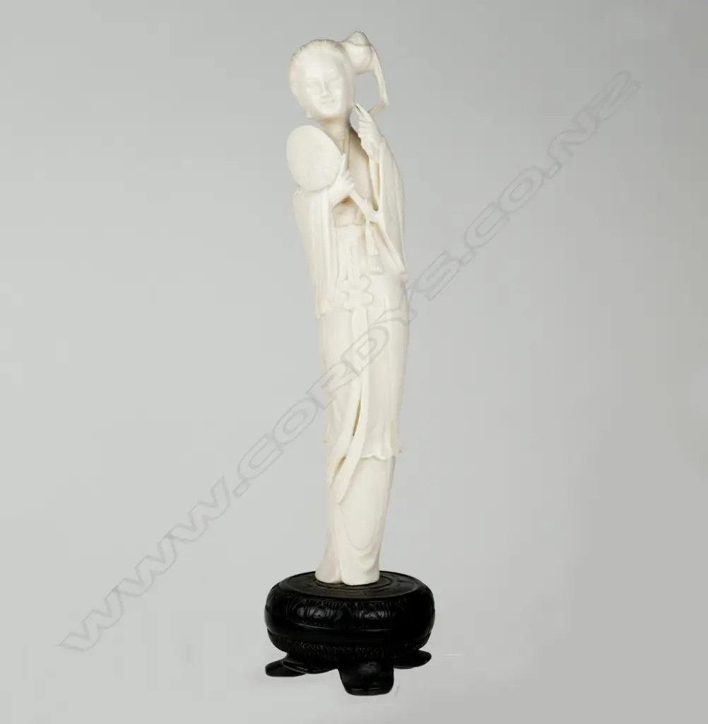 A Chinese ivory figure of a woman Image 1++