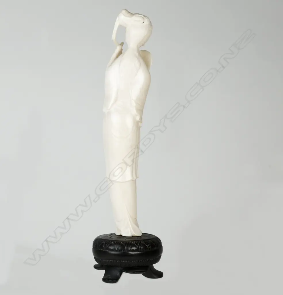 A Chinese ivory figure of a woman Image 1++