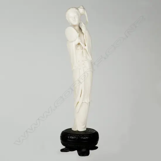 A Chinese ivory figure of a woman