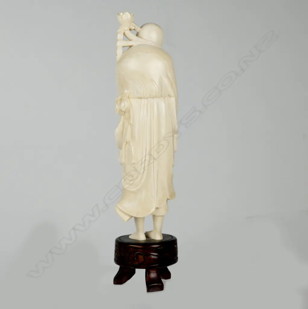 A Chinese ivory figure of an immortal Image 1++