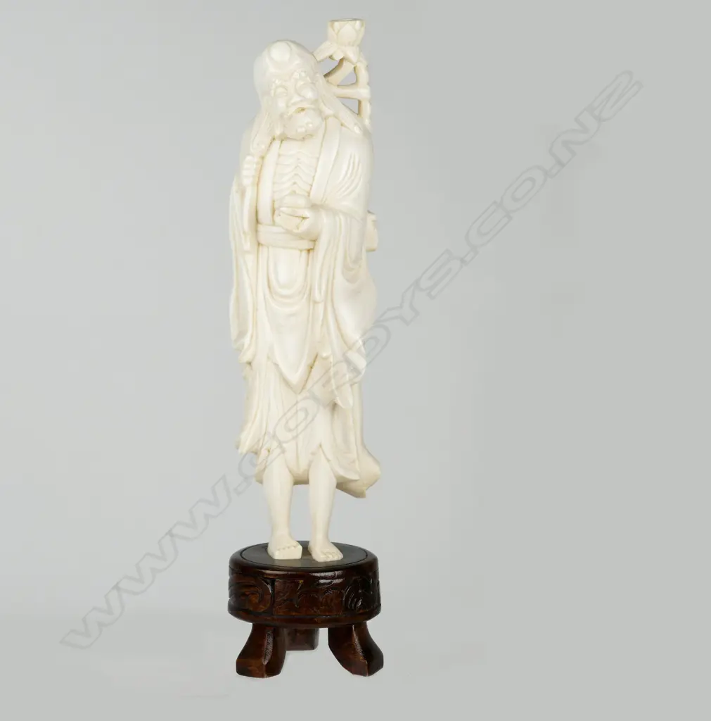 A Chinese ivory figure of an immortal Image 1++