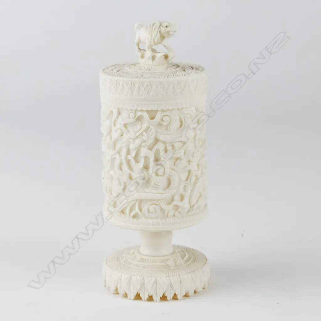 A Chinese carved cylindrical ivory canister on pedestal base Image 1++