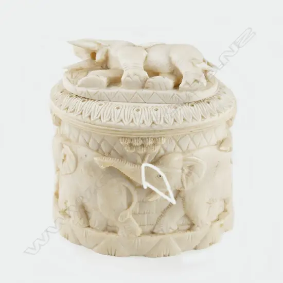 A carved ivory tusk box