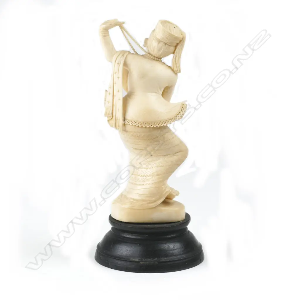 A Chinese carved ivory fisherman figure Image 1++