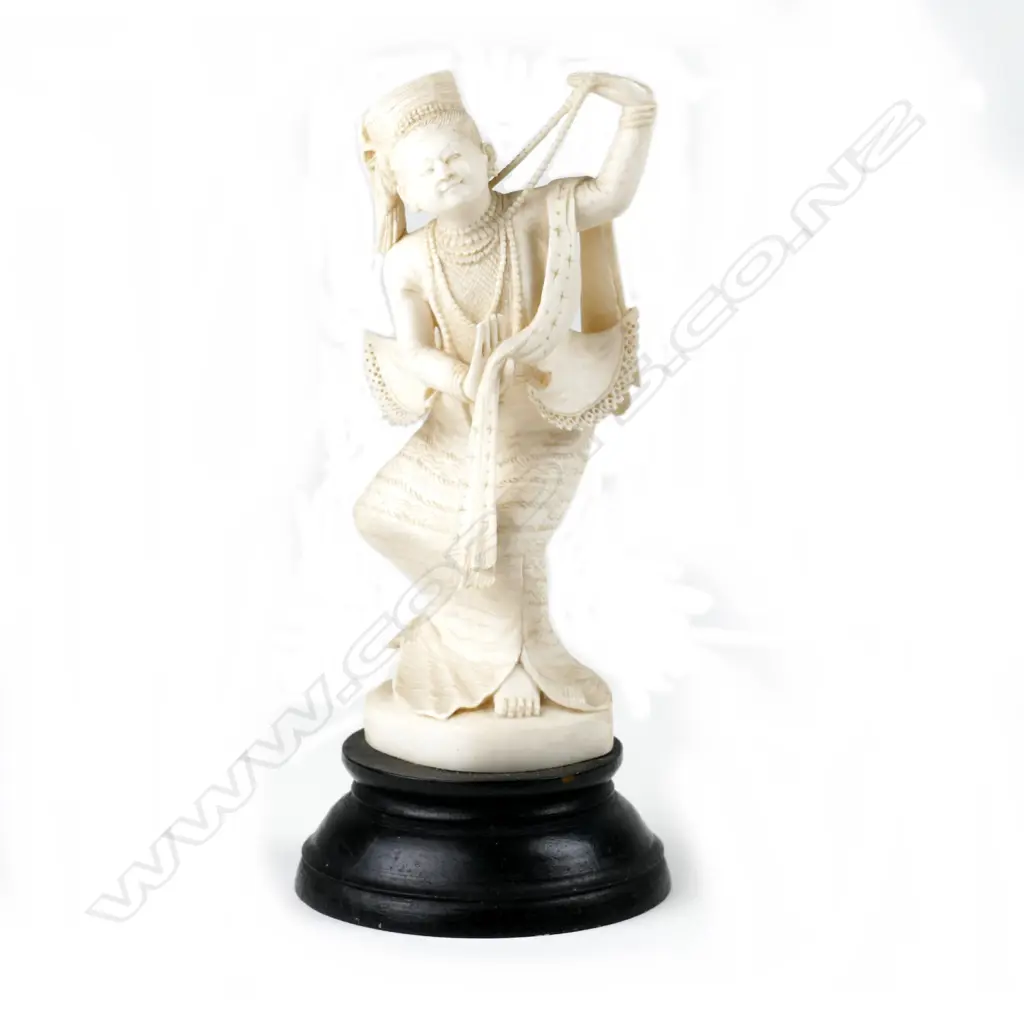 A Chinese carved ivory fisherman figure Image 1++