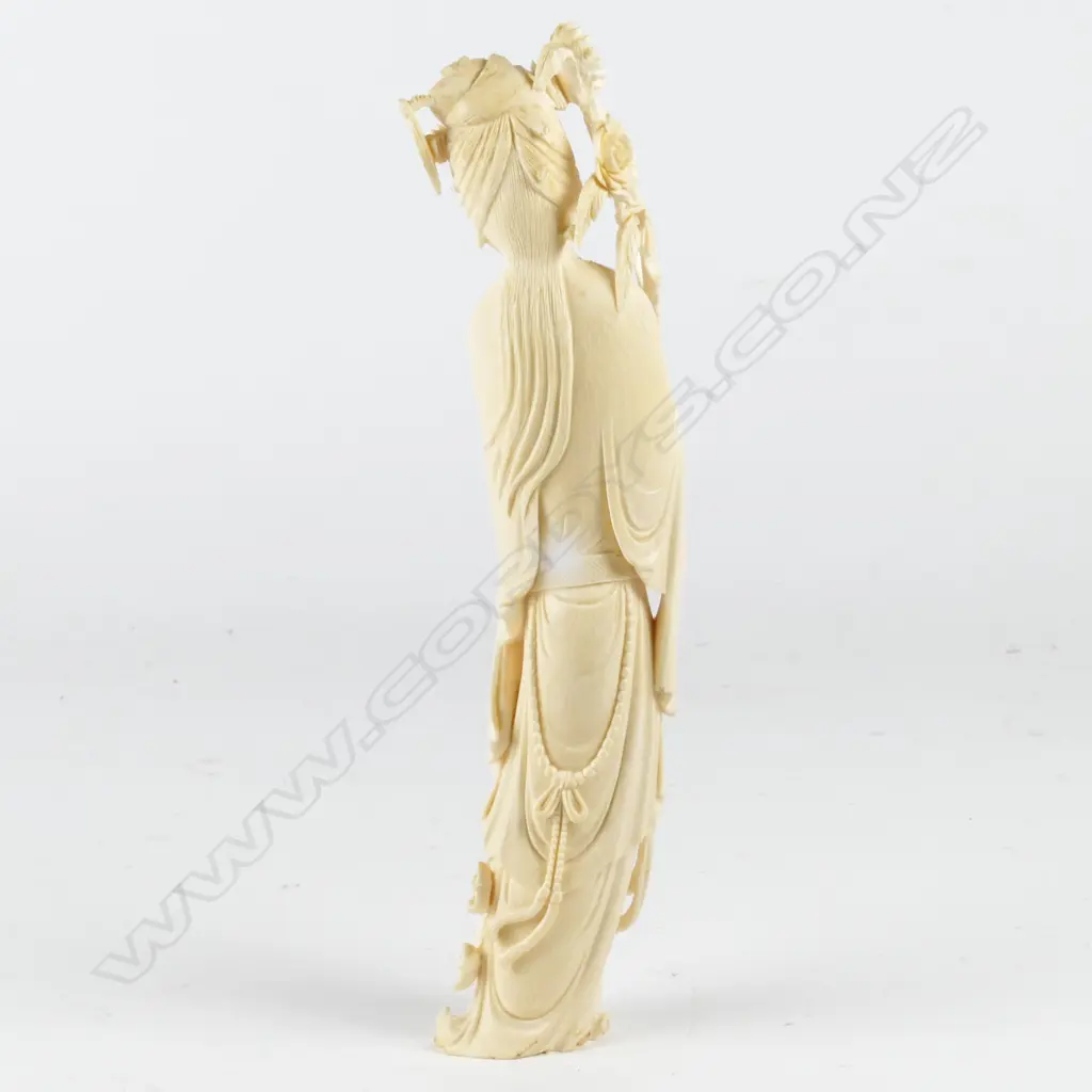 A Chinese carved ivory figure of a beauty Image 1++