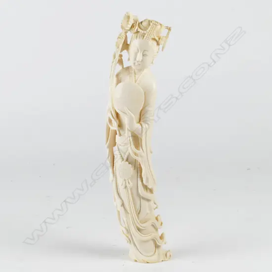 A Chinese carved ivory figure of a beauty