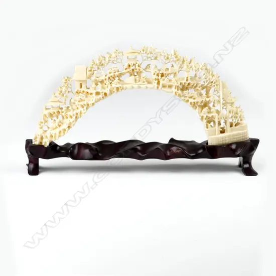 A Chinese carved hippopotamus tusk
