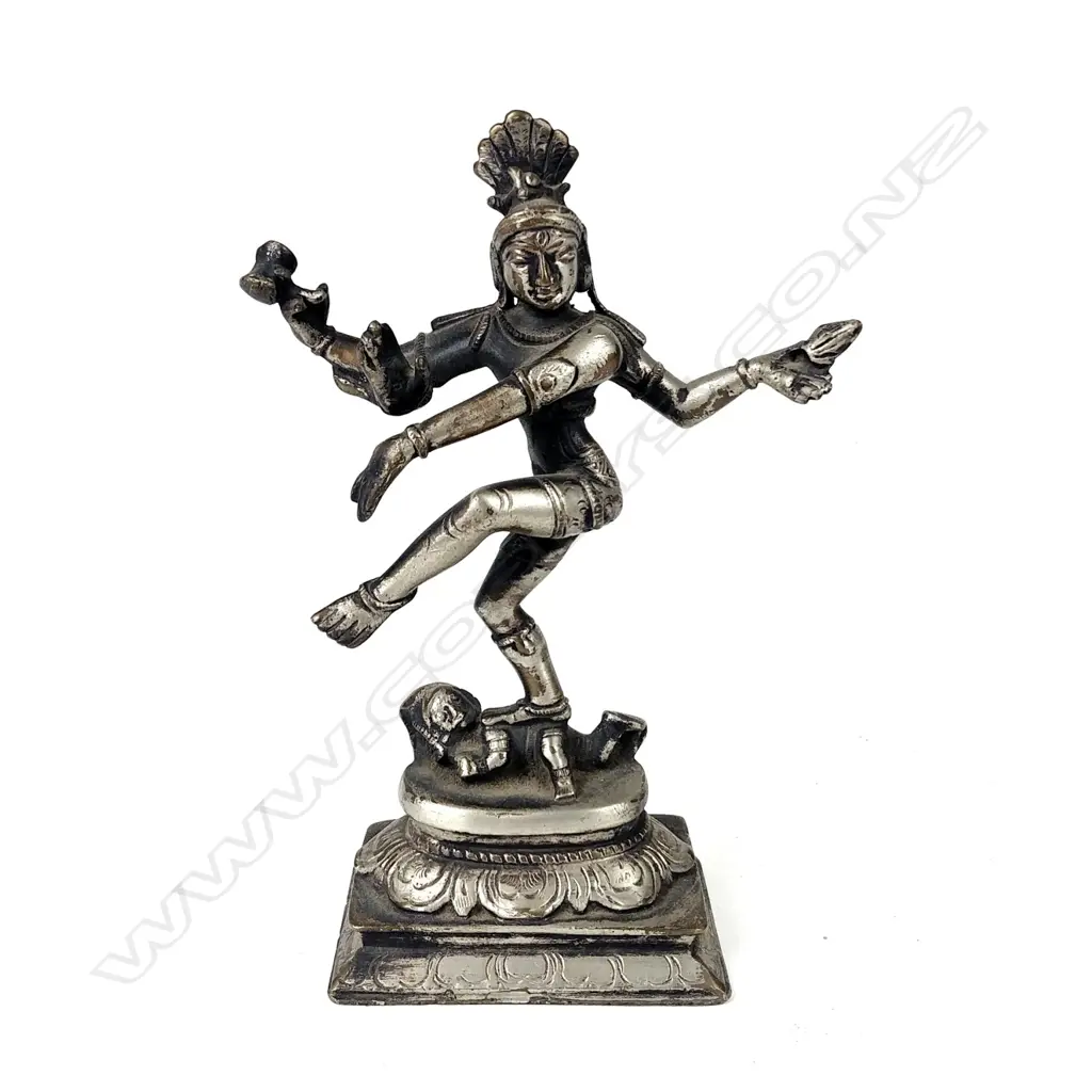 An Indian silvered bronze figure of a multi-armed dancing deity Image 1++