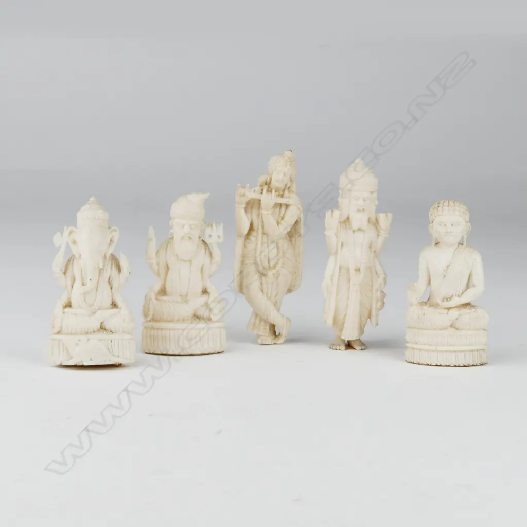 Five small ivory carvings of deities from various religions Image 1++