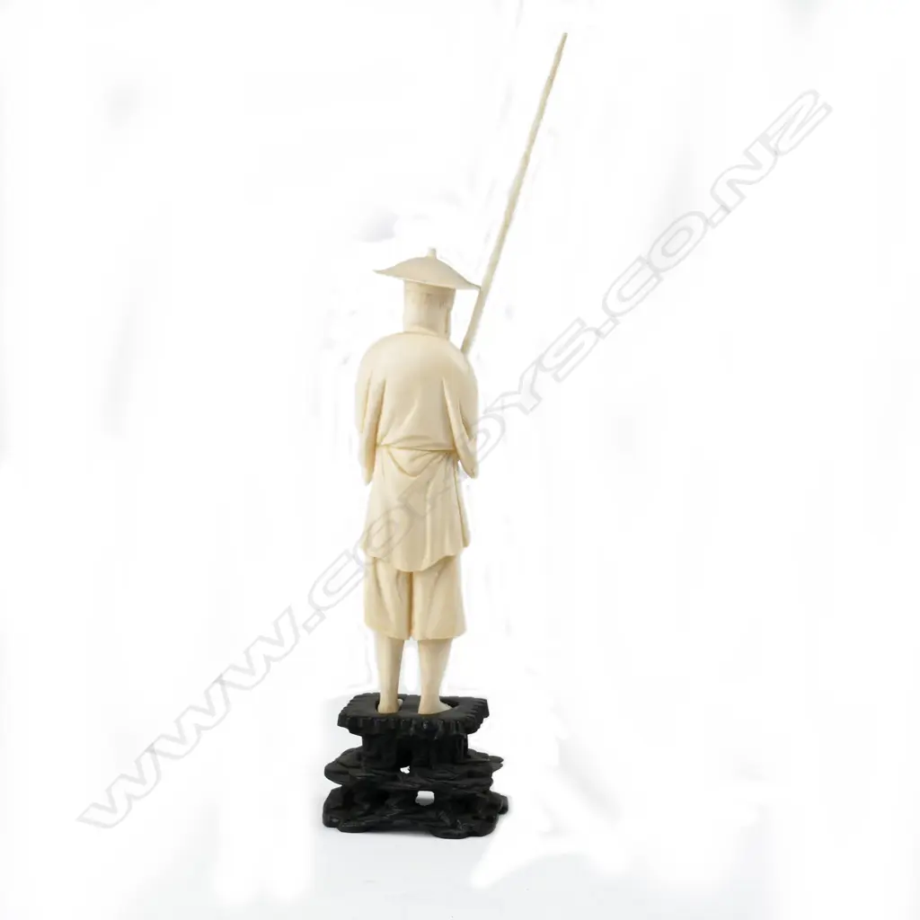 A carved ivory figure of a Burmese dancer Image 1++