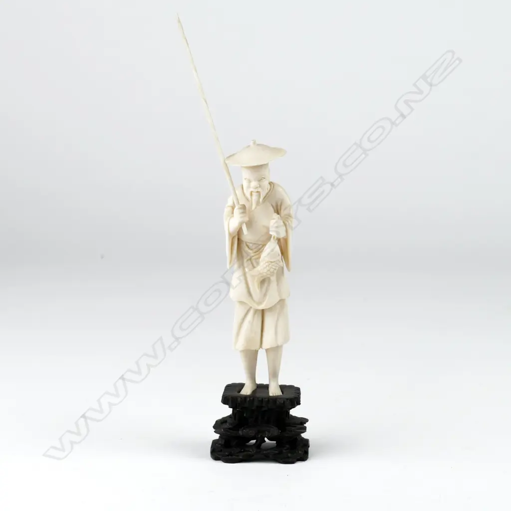 A carved ivory figure of a Burmese dancer Image 1++