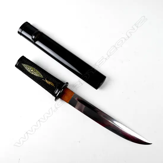A modern hand-made Japanese tanto with polished steel blade