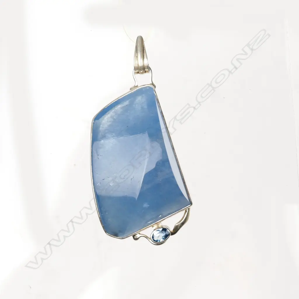 A large polished aquamarine and silver modern pendant Image 1++