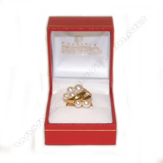 A vintage 18ct. yellow gold and pearl cluster ring
