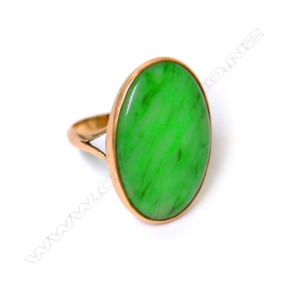 A 15ct. gold and jadeite dress ring Image 1++