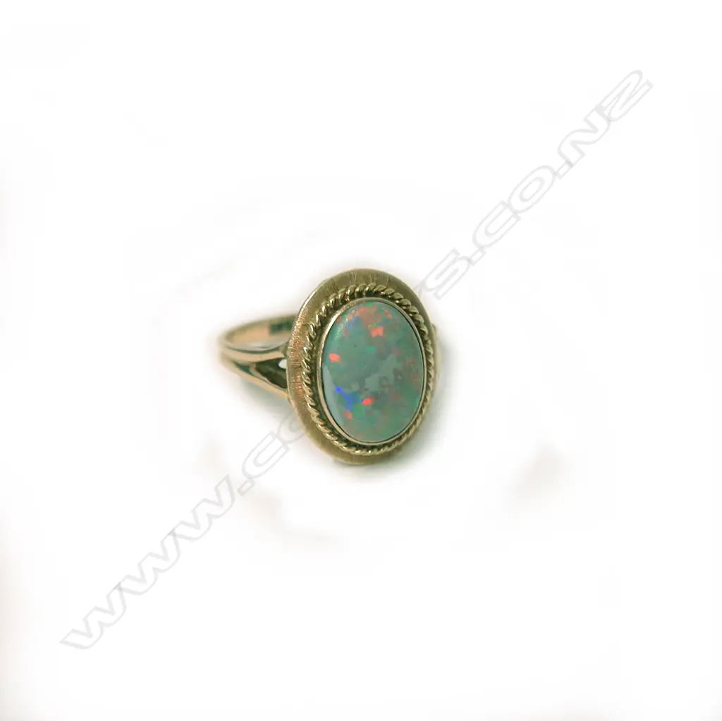 A vintage 14ct. yellow gold and opal dress ring Image 1++
