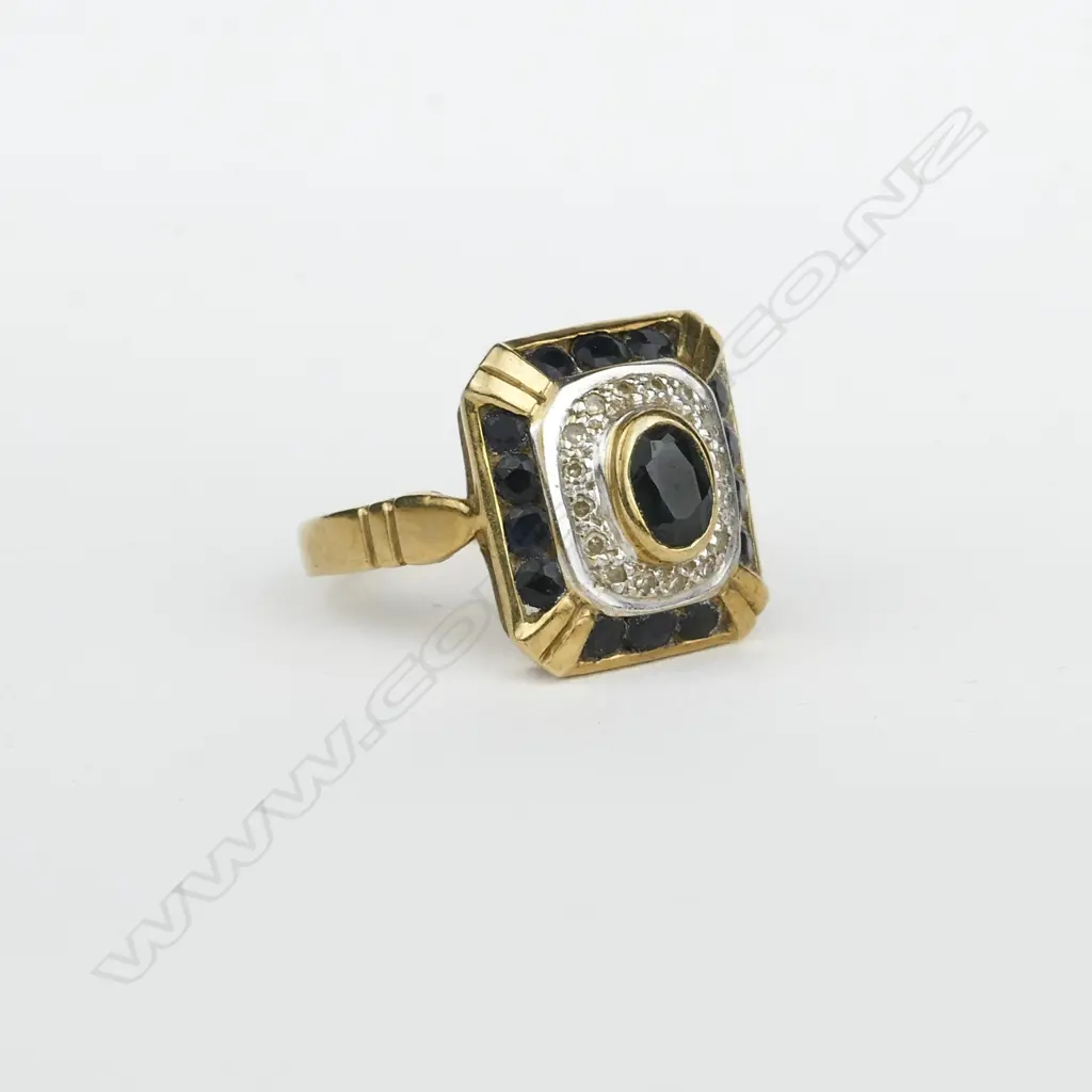 An estate 9ct. yellow gold sapphire and diamond cluster ring Image 1++