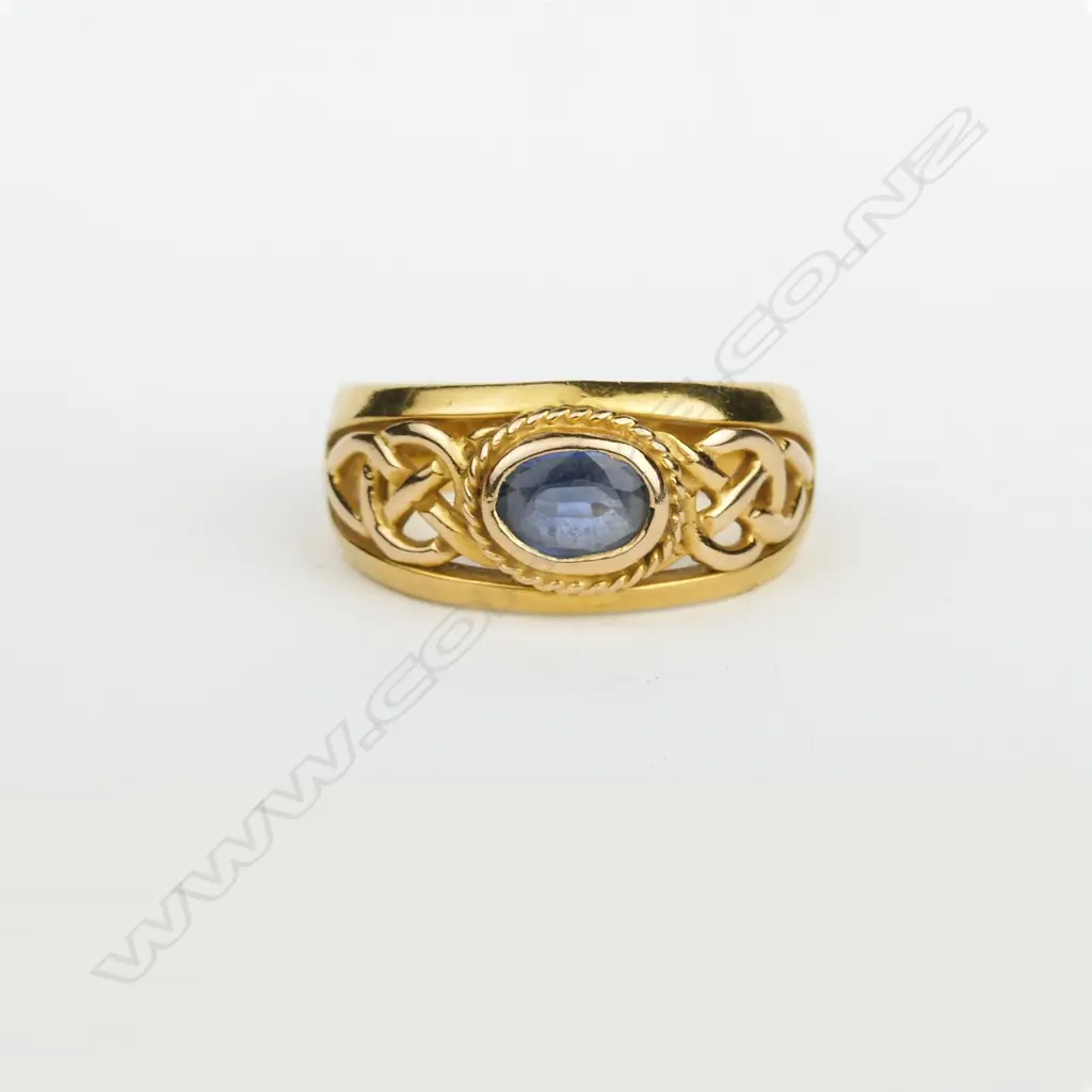 A substantial 18ct. yellow gold and sapphire dress ring Image 1++