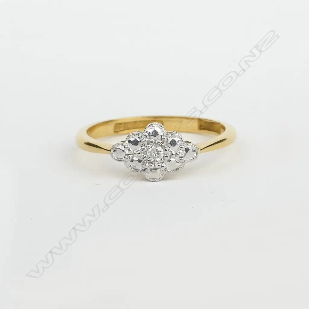 An early 20thC 18ct. yellow gold platinum and diamond dress ring Image 1++